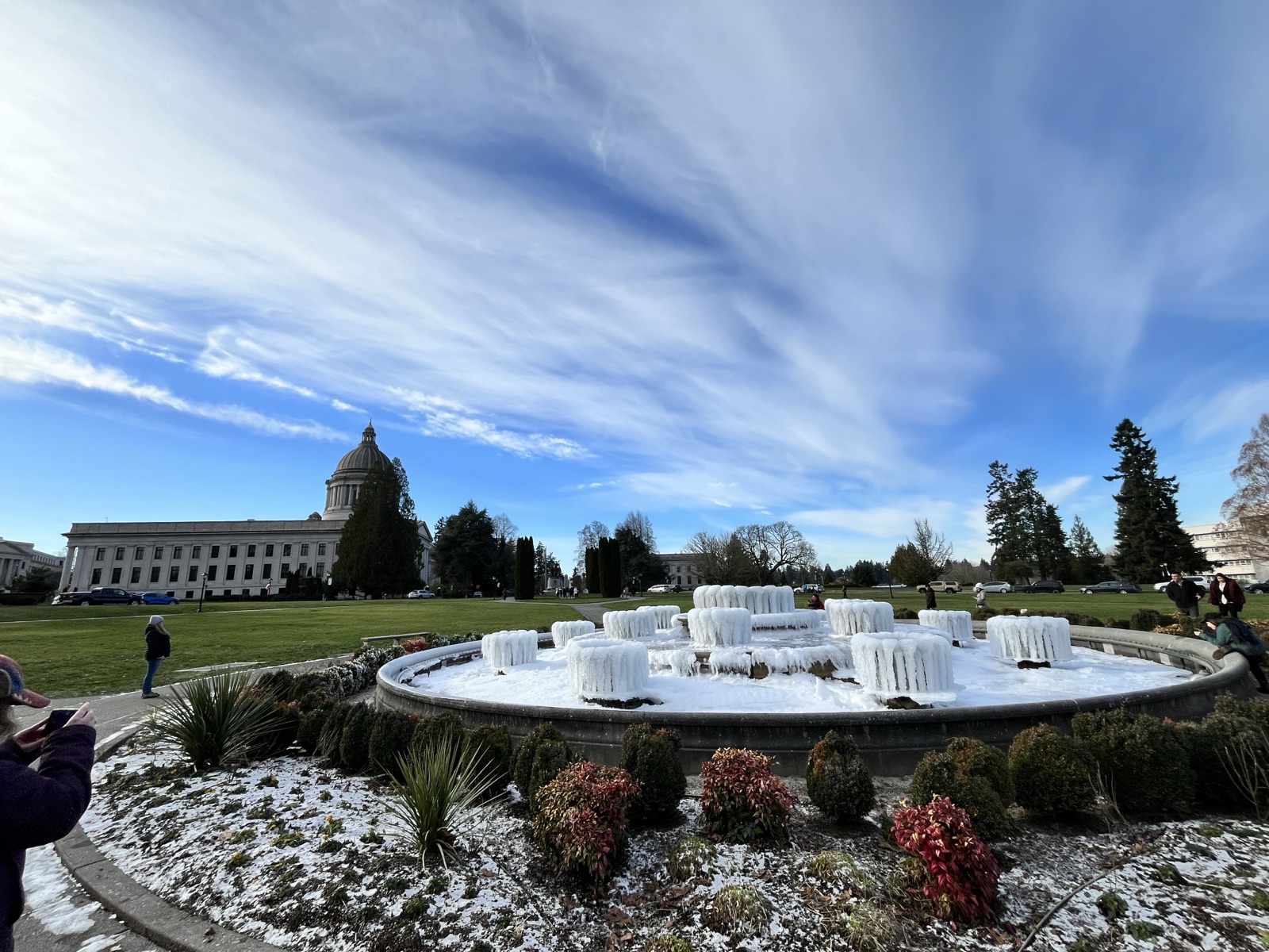The Washington State Capitol in Olympia, with a frozen fountain on the lawn